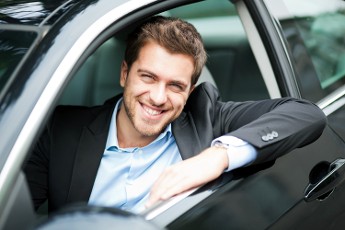 Smiling Man in Car